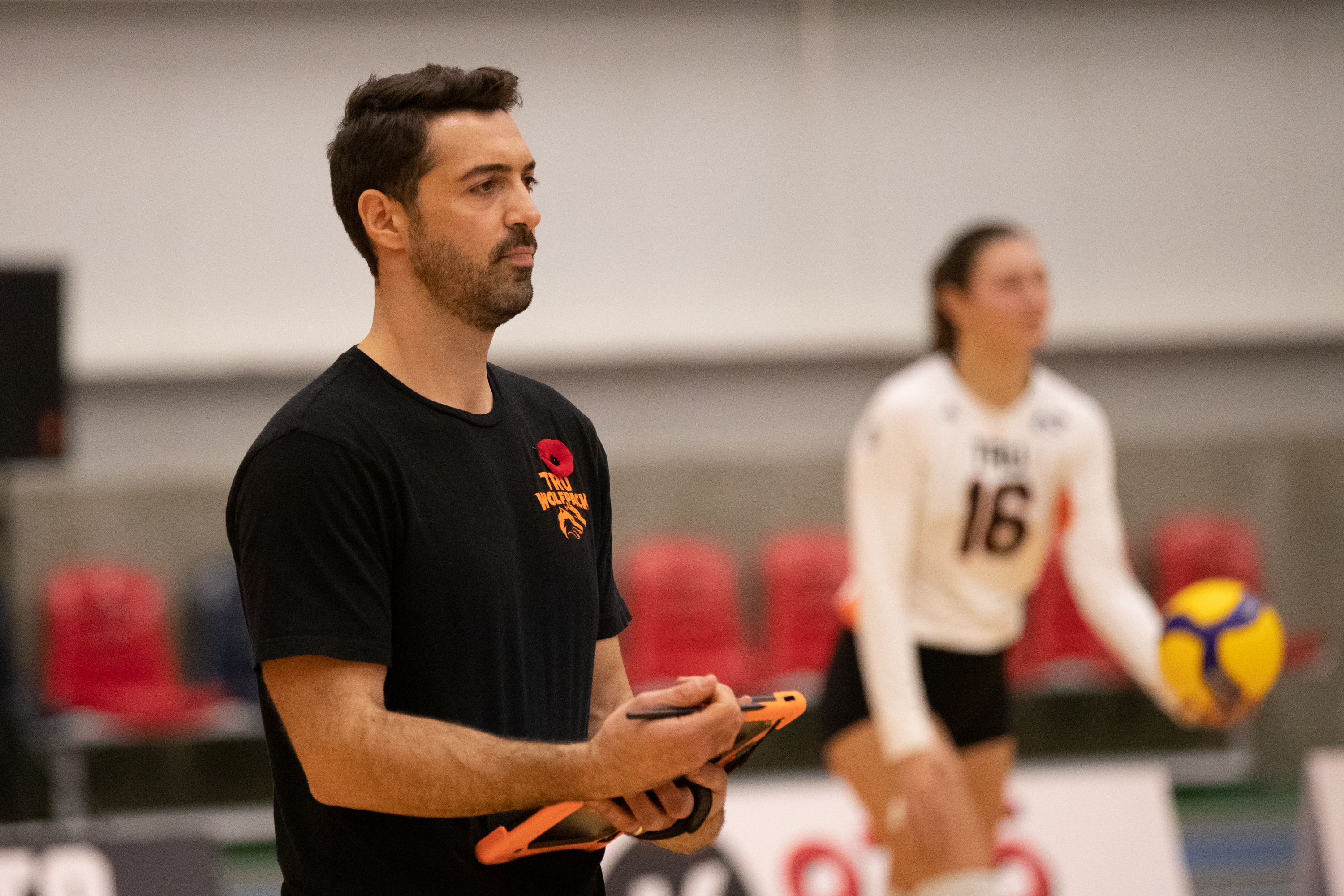 Coach Behlul giving feedback to athletes